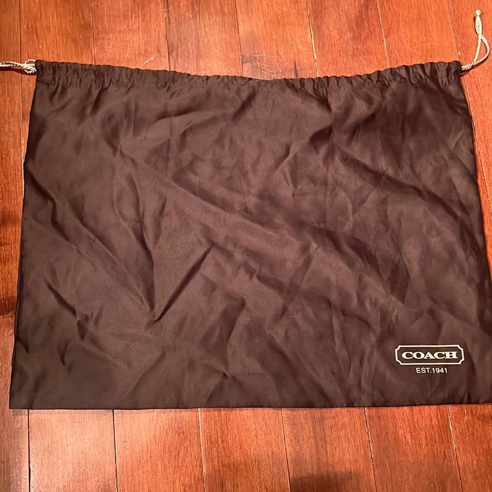 Brown coach dustbag like new never used